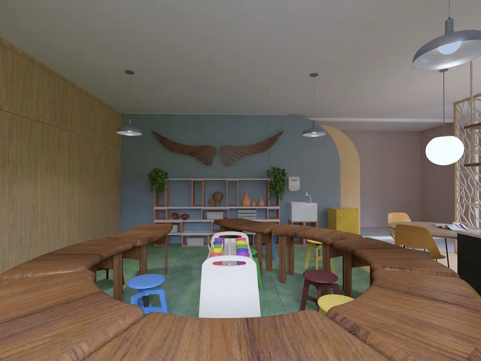 Ateliê da Alegria Criativa: a mesa redonda do ateliê, sob o arco da parede